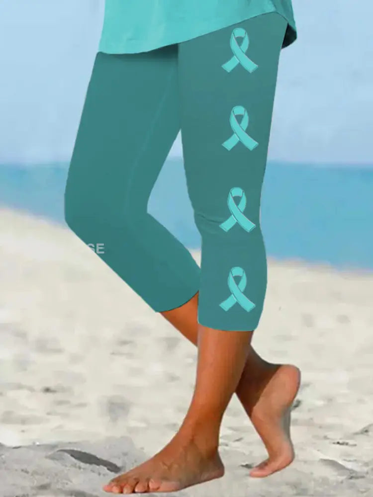Kvinnors Teal Ribbon Ovarian cancer medvetenhet Stöd beskärda Leggings blågrön / S