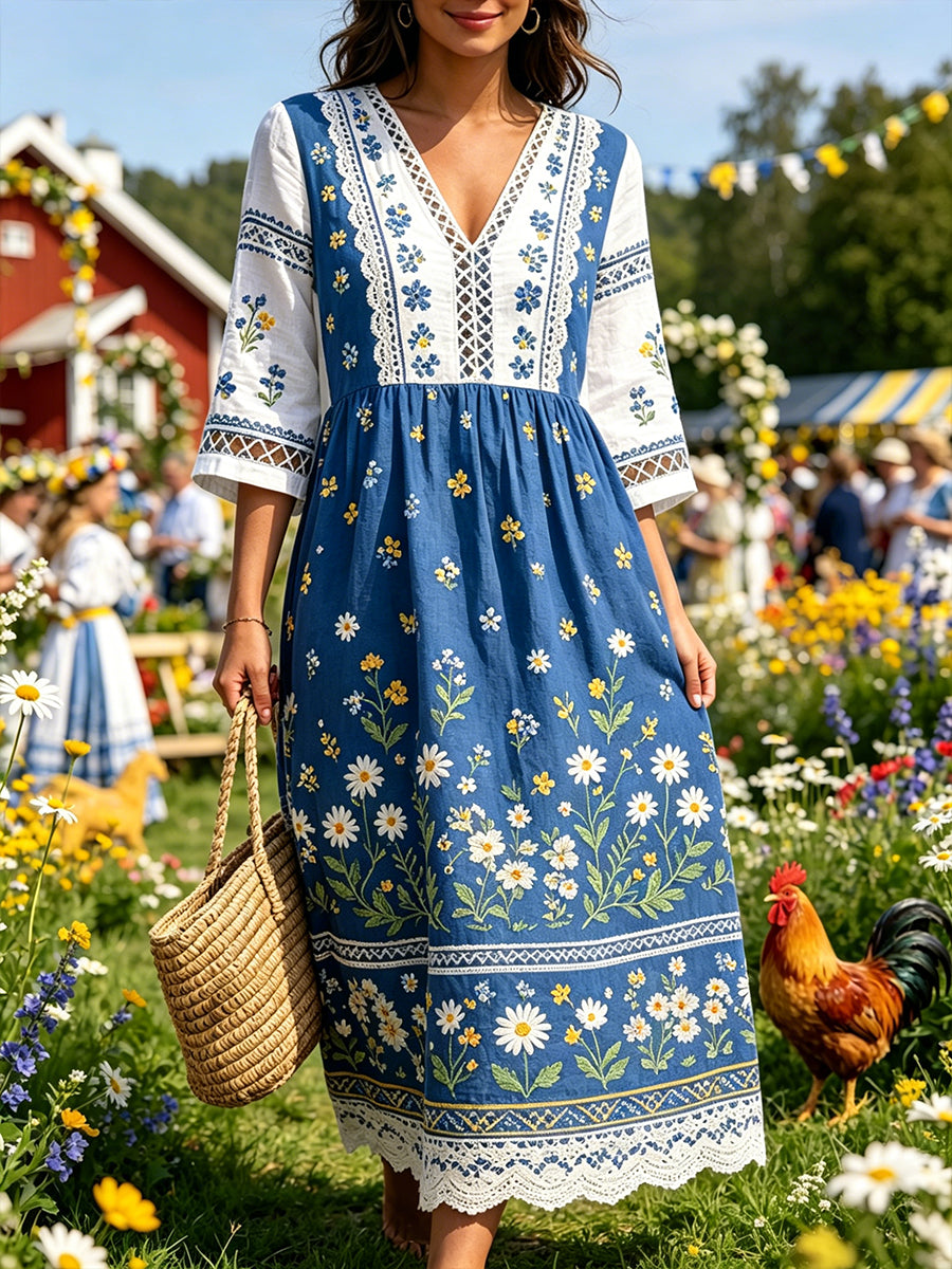Damskjorta i midsommarstil med V-ringning och etniskt mönster