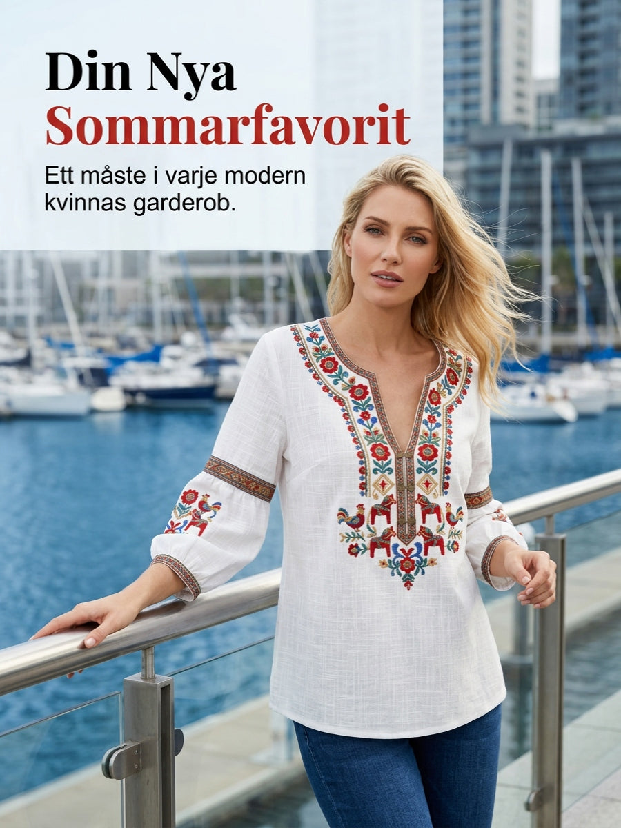 Dams blus i vintagestil, inspirerad av den svenska midsommartraditionen, i bomull och linntyg