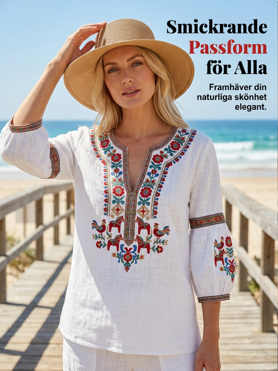 Dams blus i vintagestil, inspirerad av den svenska midsommartraditionen, i bomull och linntyg