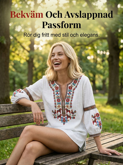 Dams blus i vintagestil, inspirerad av den svenska midsommartraditionen, i bomull och linntyg