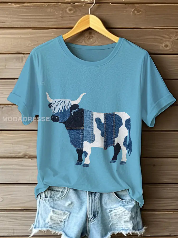 Kvinnor Denim Highland Cow T-shirt ljusblå / S