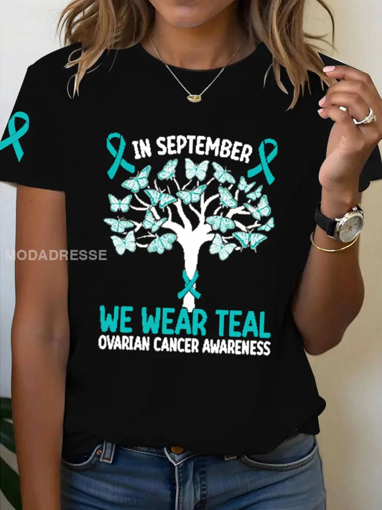 Kvinnor I september bär vi Teal äggstockscancer medvetenhet T shirt svart / S