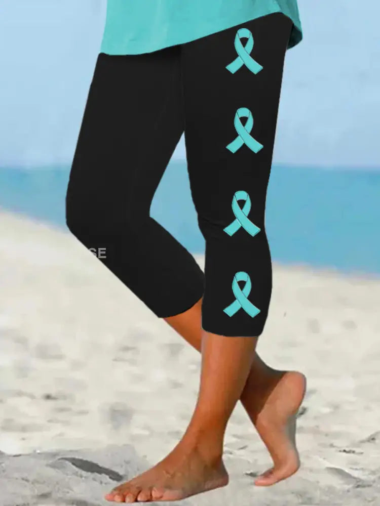 Kvinnors Teal Ribbon Ovarian cancer medvetenhet Stöd beskärda Leggings svart / S