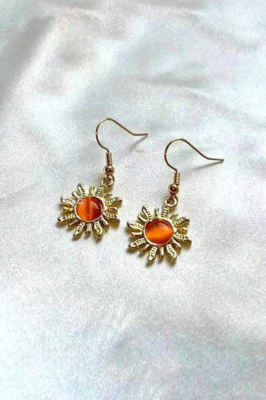 Materiale: Katteøyesteing guld