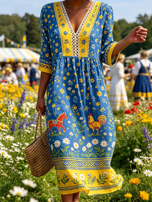 Damskjorta i midsommarstil med V-ringning och etniskt mönster
