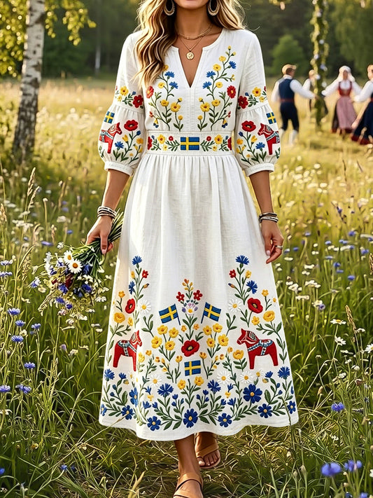 Dams klänning i vintagestil med kornblomsmönster och v-ringning