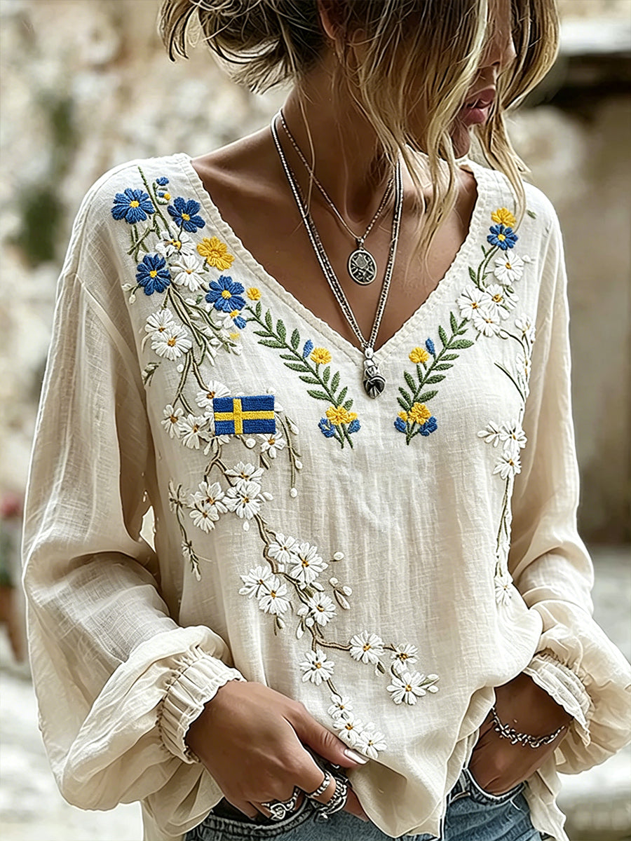 Dams midsummer-topp i linneimitation med blommönster och långa ärmar