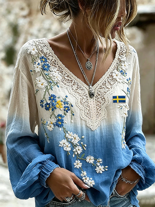 Dams midsummer-topp i linneimitation med blommönster och långa ärmar